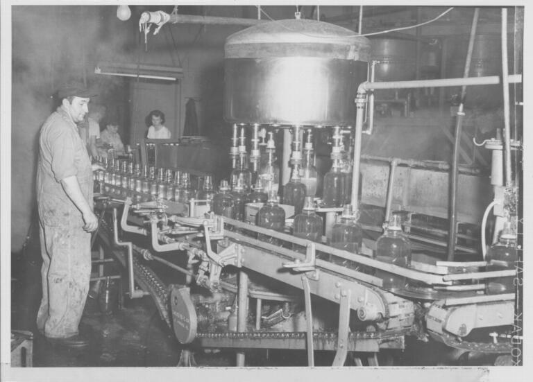 Pat Nichols working on the Spinks Corners Fruit Exchange bottling line